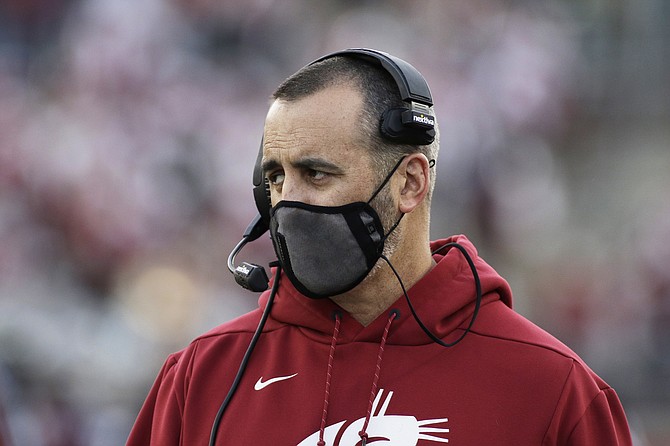 Then-Washington State coach Nick Rolovich watches during a game against Stanford in Pullman, Wash., Oct. 16, 2021. (Young Kwak/AP, file)