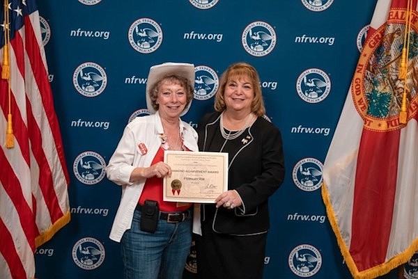 Courtesy photo
FRW President Anita Trone, left, accepts the Diamond Achievement award from NFRW President Ann Schockett.