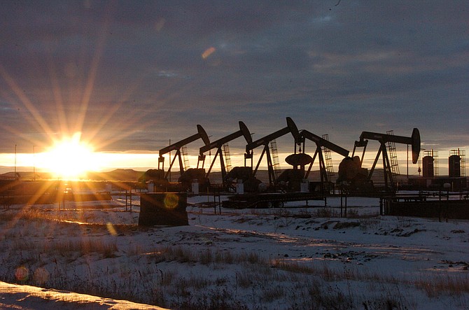 Oil pump jacks in McKenzie County in western North Dakota seen Jan 14, 2015. (Matthew Brown/AP, file)