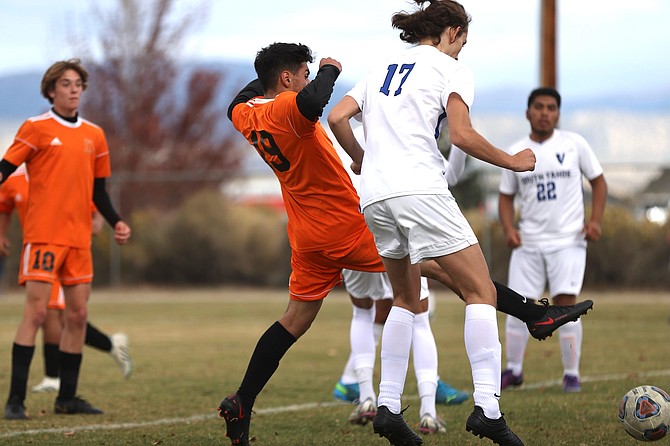 Gustavo Villalovos (19) knocks in Douglas' only goal of the afternoon in a 1-1 draw against South Tahoe Thursday.
