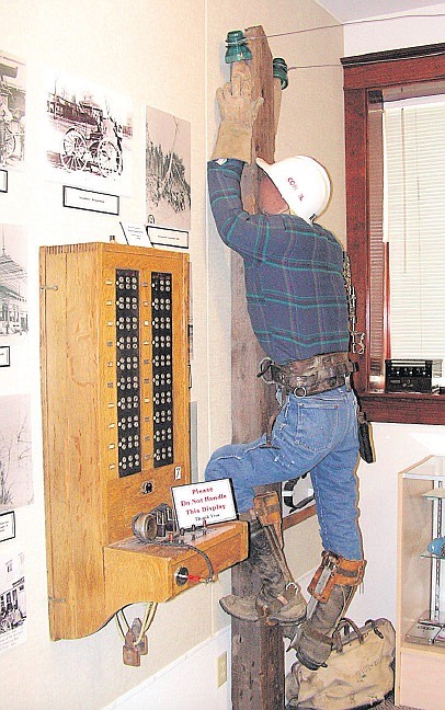 A display in the Carson Valley Museum & Cultural Center of the old switchboard and a lineman for the United Farmers Telephone and Telegraph Co, which served Carson Valley until 1946. In those days, people would tell the operator who they were calling.  Record-Courier File Photo