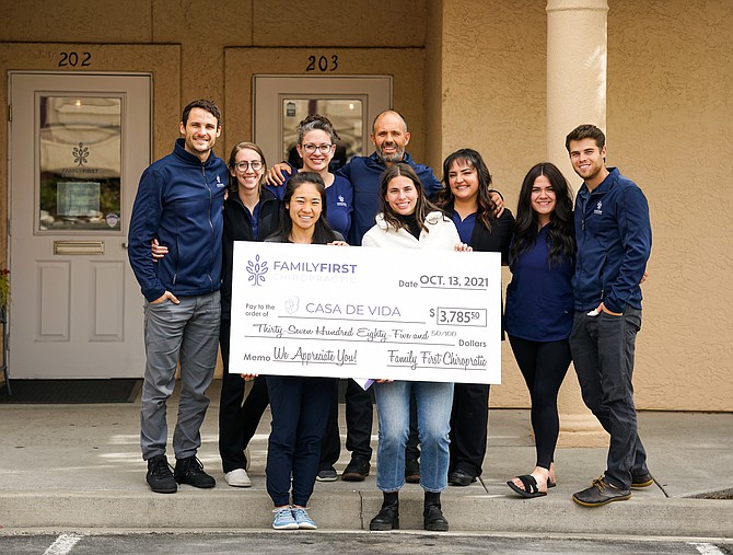 Family First Chiropractic staff presented the donation to Casa de Vida on Oct. 13.