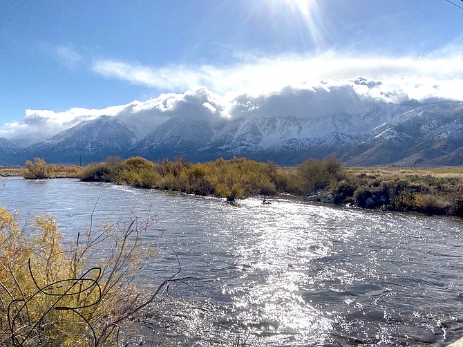 'It was wonderful to see the East Fork full after the rain,' photographer Laura Bridwell said. This photo of the river with Jobs Peak in the background was taken from the Muller Lane bridge.