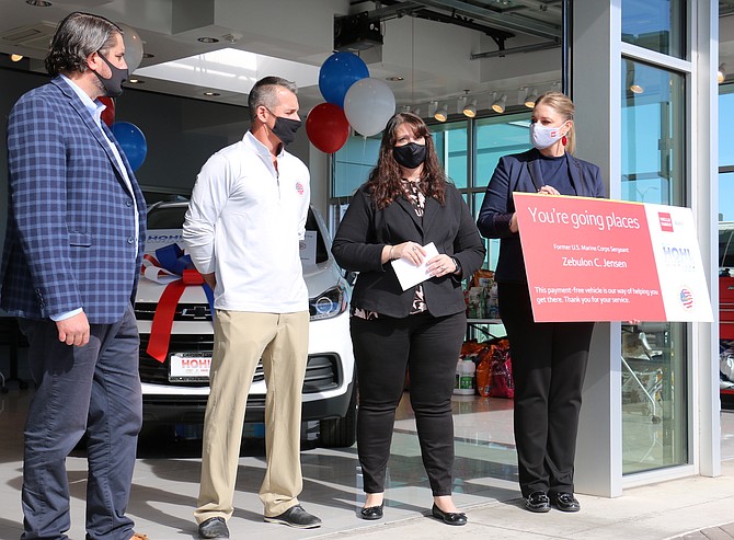 From left, Michael Hohl automotive general manager Matthew Hohl; former U.S. Marine Corps Sgt. Zebulon Jensen of Reno; Andrea Dellinger, senior vice president of the Military Warriors Support Foundation; and Natalie Brown, communications senior manager for Wells Fargo at the Oct. 29 event.