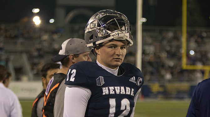 Nevada quarterback Carson Strong on the sidelines against UNLV in Reno on Oct. 29, 2021. (AP Photo/Tom R. Smedes)