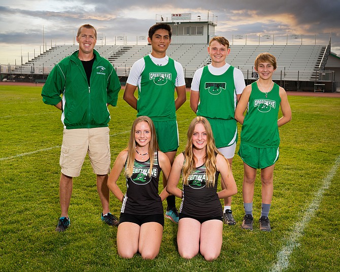 The Greenwave cross country team competed in last week’s regional meet in Sparks. The team includes, front row, from left, Savanna Regli and Zoey Brown. Back row, from left, includes coach David Ernst, Cameron Christy, Gerrick Wassmuth and Miles Hennings.