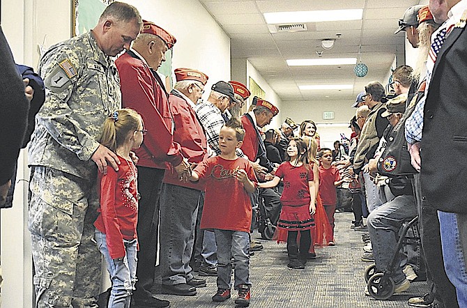 Gardnerville students greet veterans at their 2017 assembly.