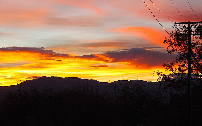 A red sky this morning could portend weather in Western Nevada today.