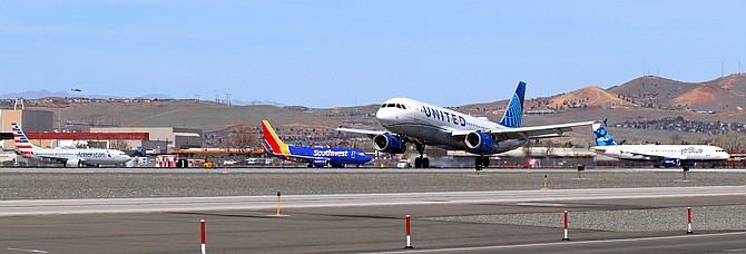 A United Airlines flight rolls on the runway at Reno-Tahoe International Airport in April 2021.
