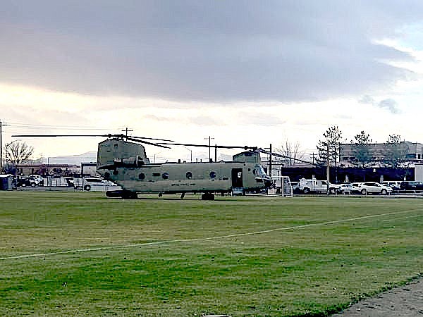 A CH-47 arrived at Douglas High School early on Tuesday for the annual Douglas High School Service Orientation Day. The helicopter was available for tours and briefings as students asked questions about aviation and the capabilities of military helicopters. Photo by Michael Freemyer
