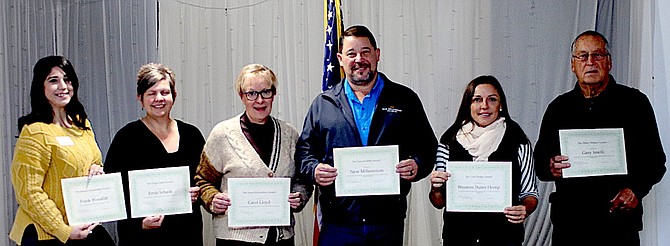 From left are Sara Beebe, director of Operations for CEDA who’s holding Frank Woodliff’s III certificate; CEDA board member Summer Stephens with Ernie Schank’s certificate; Churchill County Librarian Carol Lloyd; Guy Gibson, New Millennium Building Solutions; Adrienne Snow, Western Hemp; and Gary Imelli, Fallon Youth Club. Woodliff and Schank were not present because of prior commitments.