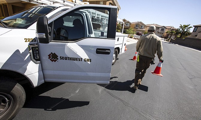 A Southwest Gas technician makes a service call in Las Vegas on Friday, April 16, 2021.