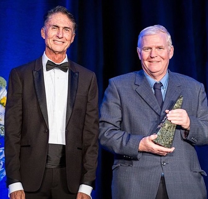 Larry Barker, right, was inducted into the Nevada Broadcasters Association Hall of Fame last month.
