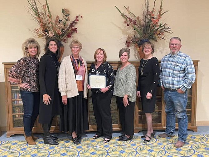 From left are trustees Amber Getto, Tricia Strasdin and Carmen Schank; CCMS Principal Amy Word, the Nevada School Board Association’s Administrator of the Year; Superintendent Summer Stephens; and trustees Kathryn Whitaker and Fred Buckmaster.