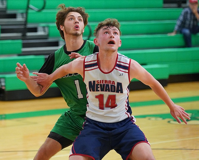 Fallon senior Collin Brun, the team’s only returner from the state championship season, looks to get the rebound during a summer tournament in Fallon.