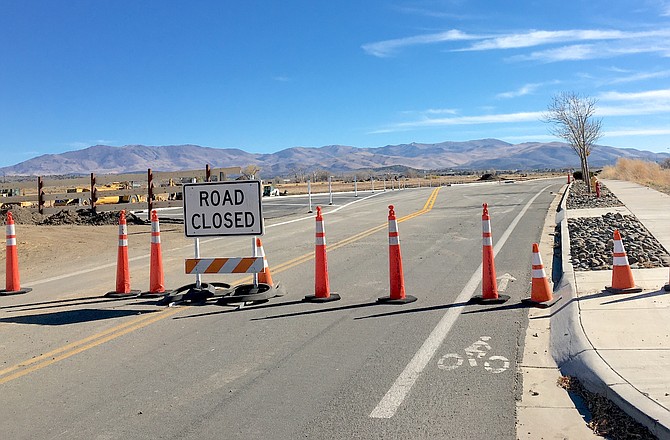 Work on widening Muller Parkway south of Gardnerville is being conducted in compliance with Peri Enterprises development agreement with the county. Meanwhile on the north end of the Parkway, another development agreement that would require construction of a section of the road is out of compliance, according to the county.