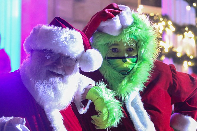 Even Santa and The Grinch came together Friday night at Silver & Snowflakes in Carson City.