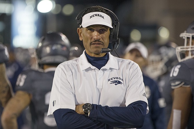 Nevada head coach Jay Norvell works the sideline against New Mexico on Nov. 2, 2019 in Reno. (AP Photo/Tom R. Smedes, file)