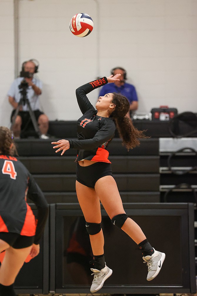 Douglas High senior Mia Bertolone goes up for an attack early in the season. Bertolone was awarded with first team all-region honors for her play on the court this season with the Tigers.