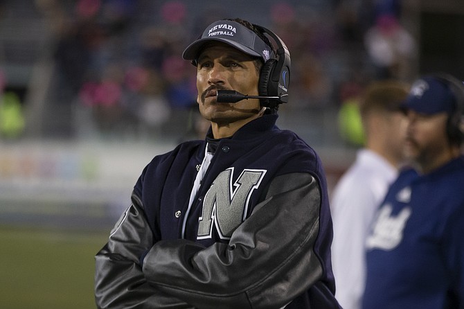 Nevada head coach Jay Norvell works the sidelines against New Mexico State in Reno on Oct. 9, 2021. (AP Photo/Tom R. Smedes)