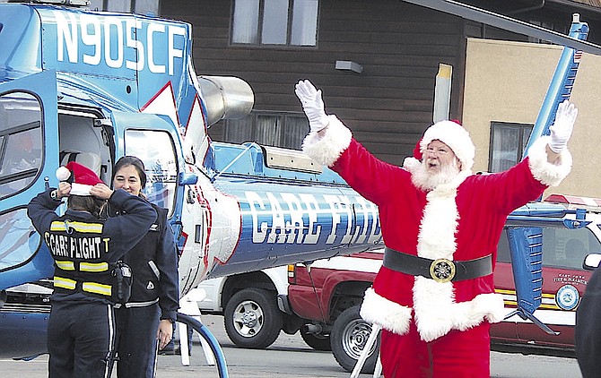 Santa arrives at the 2019 Share Your Christmas Food Drive on board Care Flight. With sunny skies in the forecast, he shouldn't have to tap Rudolph to find his way to Minden 9:30-10 a.m. Friday.