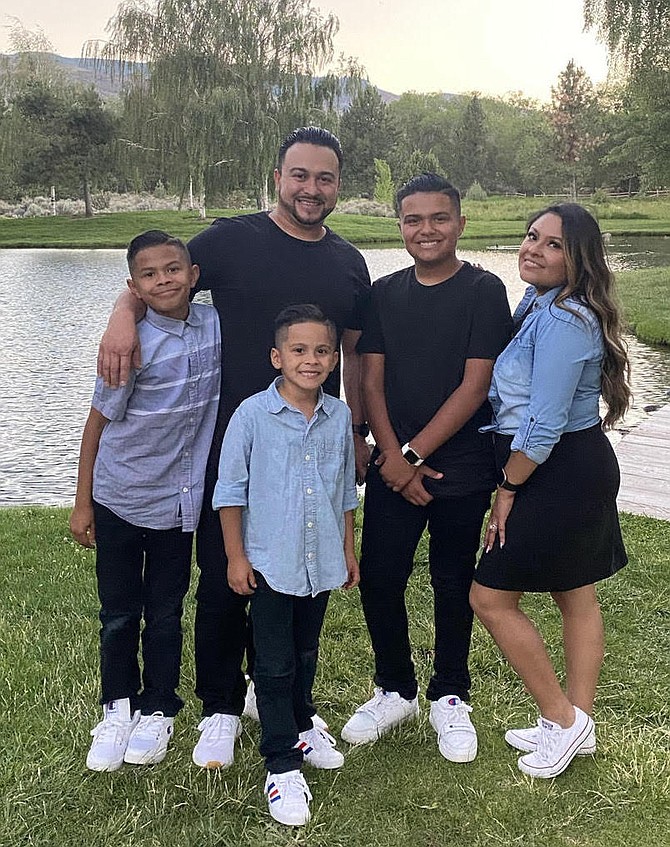 Evelyn and Francisco Espinoza share an afternoon at the park with their three boys: Ezekiel, Elias and Evan.