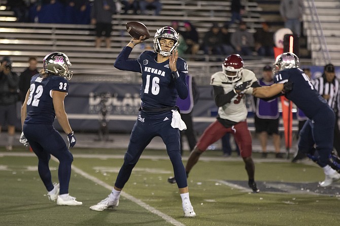 Nevada quarterback Nate Cox (16) throws against New Mexico State in Reno on Oct. 9, 2021. (Photo: Tom R. Smedes/AP)