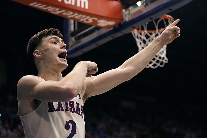 Kansas' Christian Braun celebrates after a turnover against Stephen F. Austin on Dec. 18, 2021, in Lawrence, Kan. (AP Photo/Charlie Riedel)