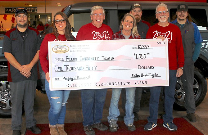 The Fallon Community Theatre was one of 14 nonprofit groups in Fallon that received a check from the Fallon Ford-Toyota Pay It Forward program. From left are Dylan Hoffman, Fallon Ford-Toyota; Star Olson, Glen Perazzo, Nancy Upham and Mike Berney, Fallon Community Theatre; and back row, Brandon Thunder, left, and Andrew Geller.