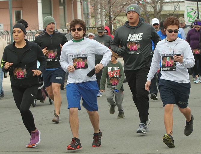 The New Year’s Day run is taking online pre-registration this week. Registration is also on the day of the race. These runners head out from the start line on Jan. 1, 2020.
Countdown to 2022