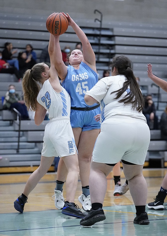 Senior Gabby Hockenberry-Grimes goes up for a rebound against Coral Academy last Tuesday.