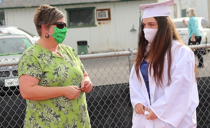 CCSD Superintendent Summer Stephens, left, talks to a student at the 2020 Churchill County High School graduation.