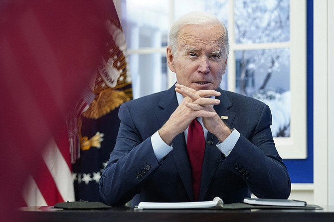 President Joe Biden speaks as he meets with the White House COVID-19 Response Team on the White House Campus in Washington on Jan. 4, 2022. (AP Photo/Andrew Harnik)