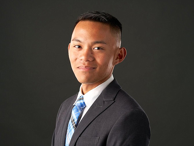 Joshua C. Palabay, a recent graduate from UNR, took home first place in the annual College of Business investment competition.