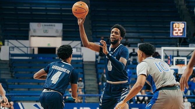 Nevada’s Warren Washington (with ball) and Desmond Cambridge against Air Force on Jan. 15, 2022 in Colorado Springs, Colo. (Photo: Nevada Athletics)