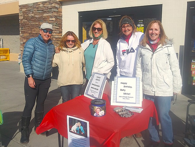 Members of the Minden Fortnightly Club, Maria Falconeri, Melinda Neilander, Becky Soderman, Debbie McNeil, and Dana Reed, held an event at Smith’s in honor of the late actress Betty White on Monday collecting more than $2,000 for the Douglas County Animal Services.