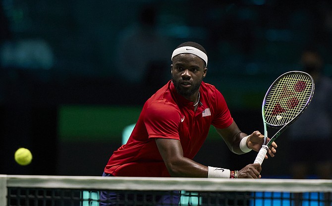 Davis Cup by Rakuten Finals 2021 at Pala Alpitour Arena on Nov. 28 in Turin, Italy. U.S Men’s Tennis player Frances Tiafoe volleys at the net.