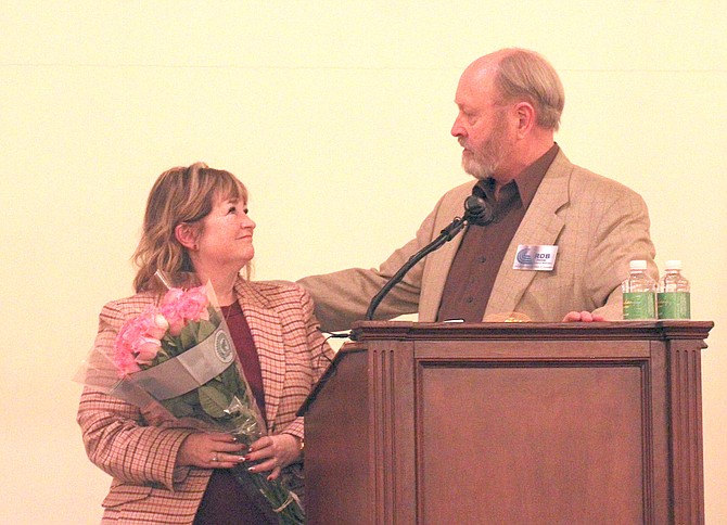 Rob Joiner, the chairman of the Chamber of Commerce’s board of directors, presented Mayor Lori Bagwell with a bouquet and his gratitude.
