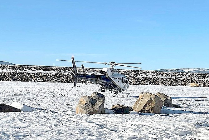 A CHP helicopter aided searchers over the weekend after a half-dozen skaters went through the ice at Stampede Reservoir. Truckee Fire Protection District photo