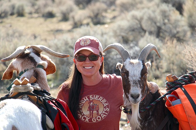Jodie Gullickson poses with Oatcake and Vincent van Goat, “Vinny.” (Photo: Faith Evans/Nevada Appeal)