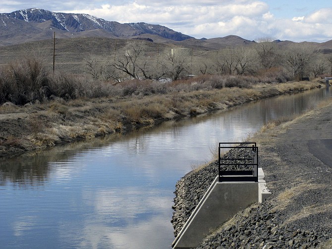 Water is shown in an irrigation canal in Fernley on March 18, 2021. (Photo: Scott Sonner/AP)