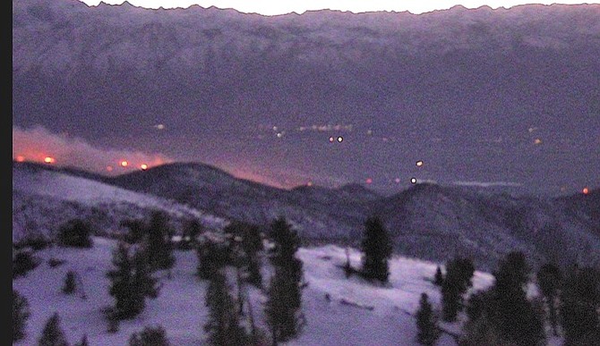 Flames can be seen on the Silver Peak Fire camera above Bishop on Wednesday evening.