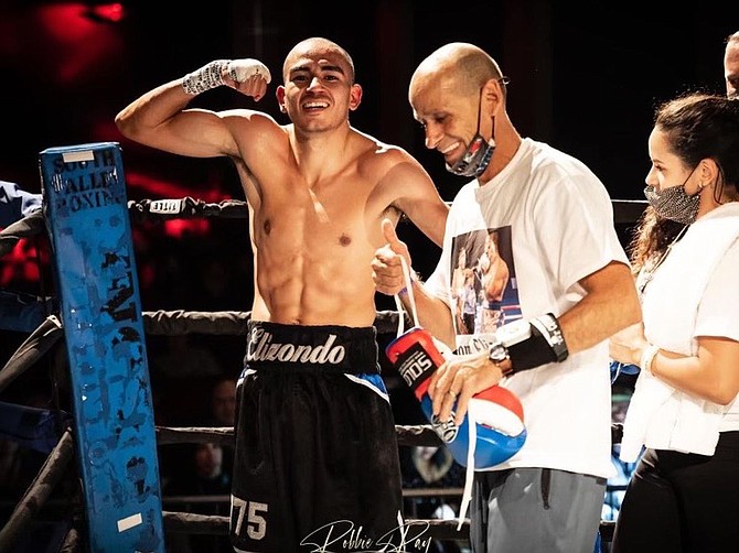Diego Elizondo flexes following a boxing match earlier in his career. Elizondo was in a rollover accident Feb. 8 that left him in a coma as a result. The family has set up a GoFundMe page to help cover medical expenses. Per his family, Elizondo’s recovery will be measured in weeks and months.