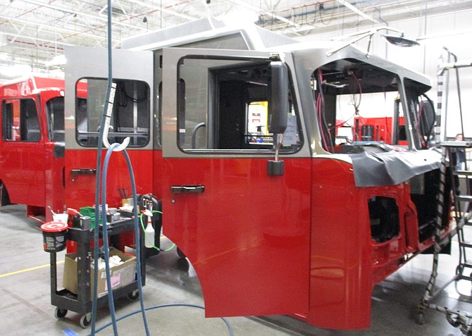 Fire truck cab is on the assembly line.