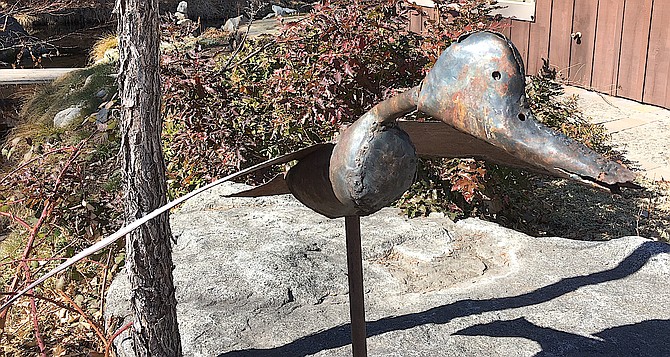 This metal goose sculpture in Genoa started out as the top of a 55-gallon oil can top.