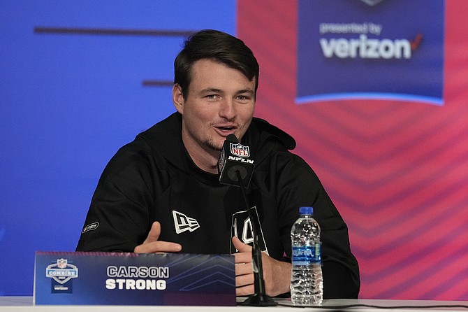 Nevada quarterback Carson Strong speaks during a press conference at the NFL football scouting combine on March 2, 2022, in Indianapolis. (AP Photo/Darron Cummings)