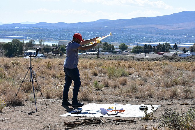 A University of Nevada, Reno researcher tests an unmanned aerial system in Reno.