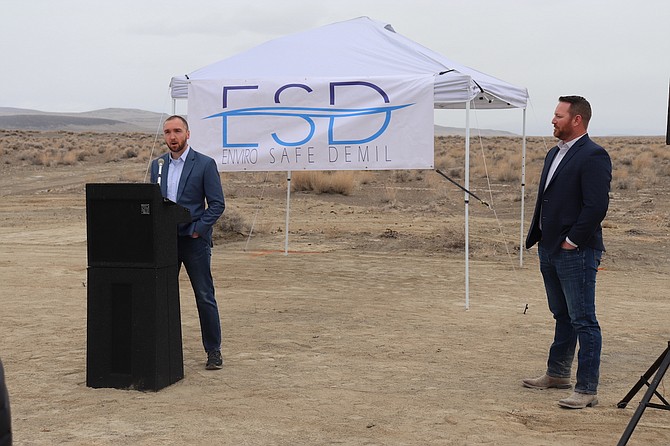 T.J. Ogden, CEO of Envirosafe Demil, LLC, welcomes attendees to the company’s groundbreaking event north of Fallon off Highway 95 on March 4 as President Michael Wentz looks on.