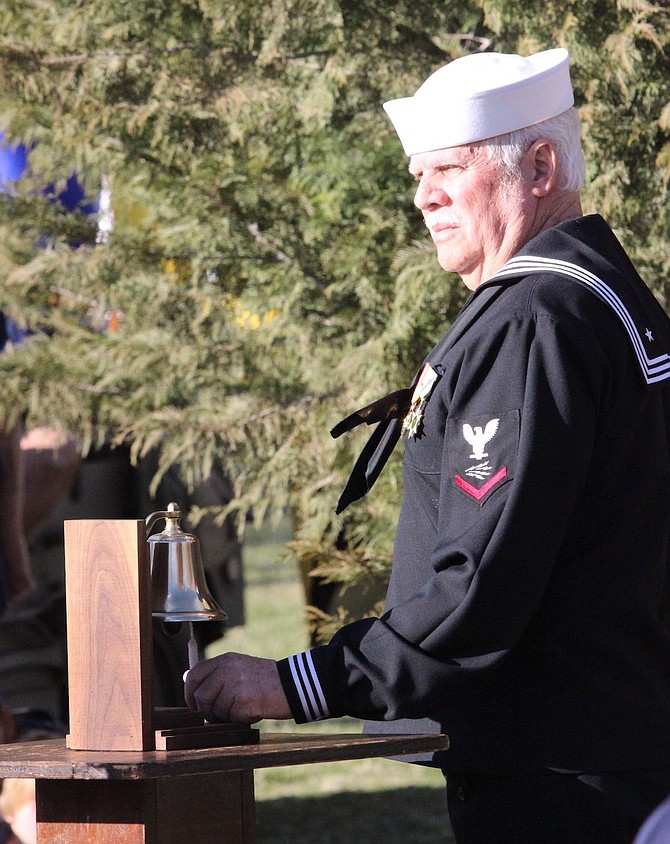 Navy veteran Don Bemis of Dayton rings a bell at a previous National Vietnam War Veterans Day ceremony at Mills Park.