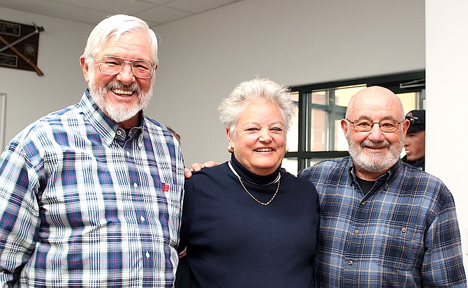 Volunteer firefighters Nate Leising, Margaret Biggs and John Babcock say farewell on Tuesday after 109 years of combined service with East Fork Fire Protection District.